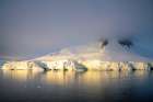 Antarctica, Leith Cove, Paradise Bay. Cruise tourists camping for night on snow bank. Art Print